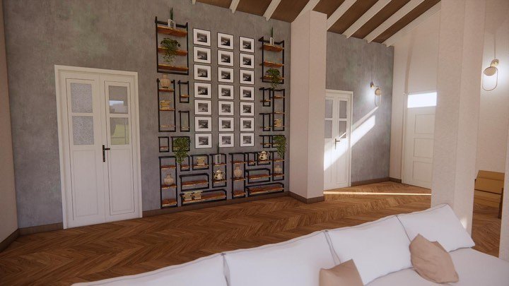 The display wall seen square on, beside panelled white doors, with a herringbone timber floor running through